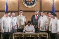Marcos OKs laws granting 25-year franchises to electric coops in Aklan, Benguet