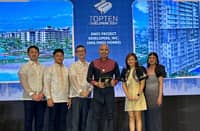Corporate Communications manager Butch Mendizabal accepted the award on behalf of DMCI Homes.