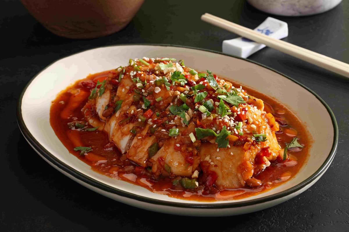 Poached chicken in ‘Sichuan’ chili vinaigrette. Photo courtesy of Jasmine Restaurant.