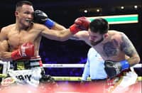 Charly Suarez (left), who knocked out American Jorge Castaneda in his last fight in Arizina, will have to wait a while before getting a shot at the WBO super-featherweight crown, according to Top Rank.