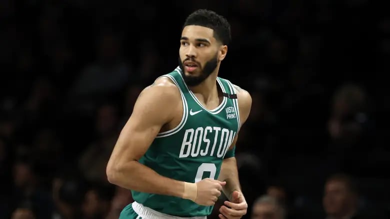 Tatum dominates as Celtics hold off Lakers; James injury scare
