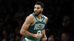 Tatum dominates as Celtics hold off Lakers; James injury scare