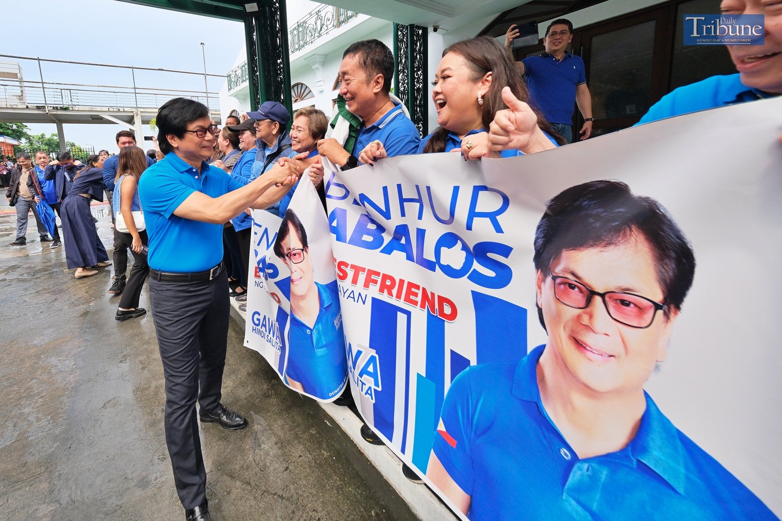 Benjamin Abalos greets supporters