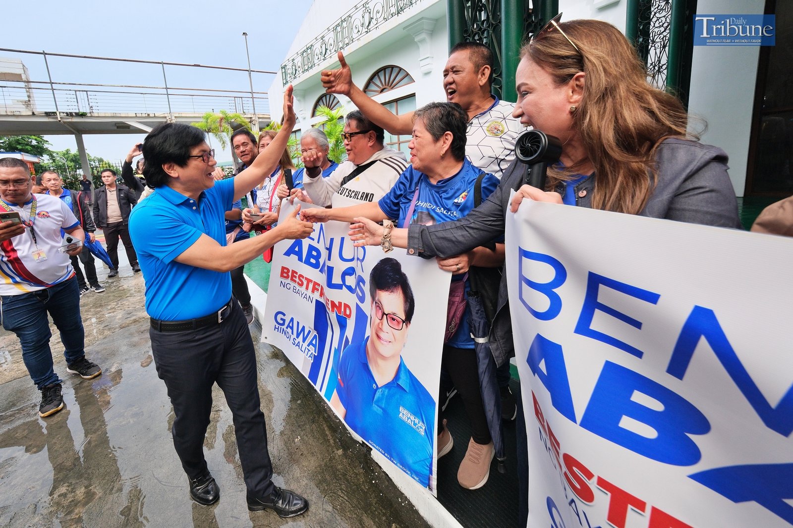 Benjamin Abalos greets supporters