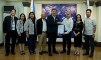 (From left) Rolando Ledesma Macasaet president and CEO, Social Security Systems and Rolando Maningas, UTOL chairman of the Board and CEO (third from right) shake hands during the formal contract signing. Also in photo are Carlos C. Villacorta, Department Head III, Professional Sector Department, SSS; Atty. Victorina B. Pardo-Pajarillo, Concurrent Acting Head, Account Management Group, Dept. Management III, NCR East Legal Department, SSS; Maria Rita S. Aguja, Senior Vice President, NCR Operations Group, SSS; Atty. Voltaire P. Agas, Executive Vice President, Branch Operations Sector, SSS; Rosalie Maningas, UTOL General Manager and Atty. Orly Ocampo, Head, UTOL Legal Department. | Photo courtesy of UTOL.