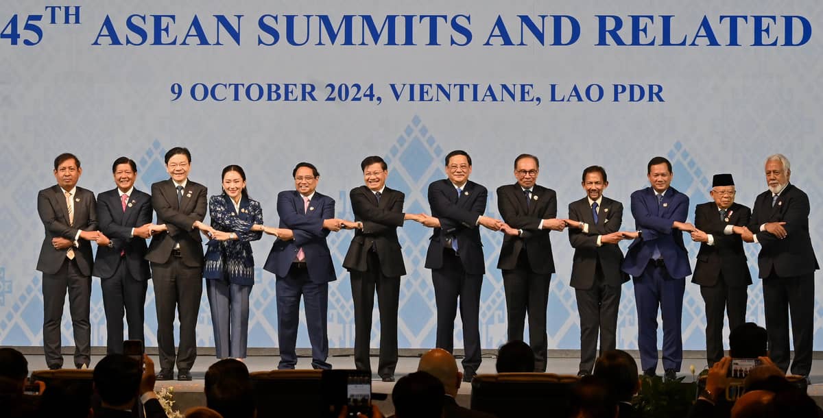 LINKING arms during the opening ceremony of the 44th and 45th Association of Southeast Asian Nations Summits in Vientiane on Wednesday. From left:  Myanmar’s Permanent Secretary of Foreign Affairs Aung Kyaw Moe, Philippines’ President Ferdinand Marcos Jr., Singapore’s Prime Minister Lawrence Wong, Thailand’s Prime Minister Paetongtarn Shinawatra, Vietnam’s Prime Minister Pham Minh Chinh, Laos’ President Thongloun Sisoulith, Laos’ Prime Minister Sonexay Siphandone, Malaysia’s Prime Minister Anwar Ibrahim, Brunei’s Sultan Hassanal Bolkiah, Cambodia’s Prime Minister Hun Mamet, Indonesia’s Vice Prime Minister Ma’ruf Amin and East Timor’s Prime Minister Kay Rala Xanana Gusmao.