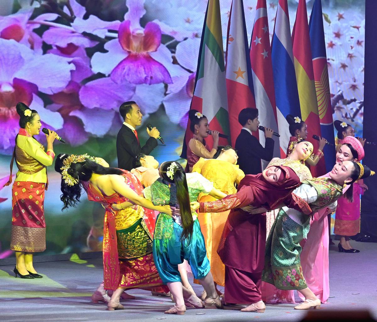 Unity in motion Dancers take the stage in a dazzling display during the opening ceremony of the 44th and 45th Association of Southeast Asian Nations Summits in Vientiane on Wednesday.
