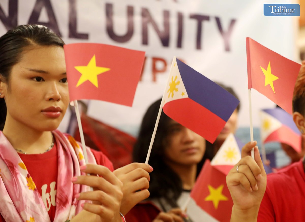 (October 10 2024)………..Members of the Alliance of West Philippine Sea Watchers wave Philippine and Vietnamese flags and shout slogans during a press conference at a restaurant in Quezon City on Thursday October 10, 2024. In response to China's aggressive actions in the West Philippine Sea, the group has called for a united ASEAN response, particularly from Vietnam, to assist the Philippines in defending sovereignty and safeguarding shared maritime interests. They also stated that a collaborative approach is critical to maintaining international law and regional stability. The Philippines and Vietnam have a history of mutual support, as evidenced by the Philippine Navy's recent assistance to distressed Vietnamese vessels, emphasizing that the strong bond between the two countries is based on cooperation, respect, and commitment to peace…………Photo/Analy Labor