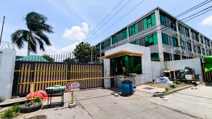 LOOK: The facilities of the Philippine Offshore Gaming Operator (POGO) Lucky South 99 in Porac, Pampanga, are cordoned off by authorities after being raided in July on suspicion of human trafficking and scamming. | Photo by Jonas Reyes