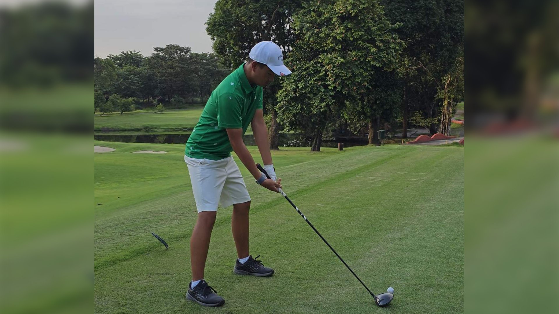 Geoffrey Tan preparing to stripe Wack Wack West Course’s No. 4.