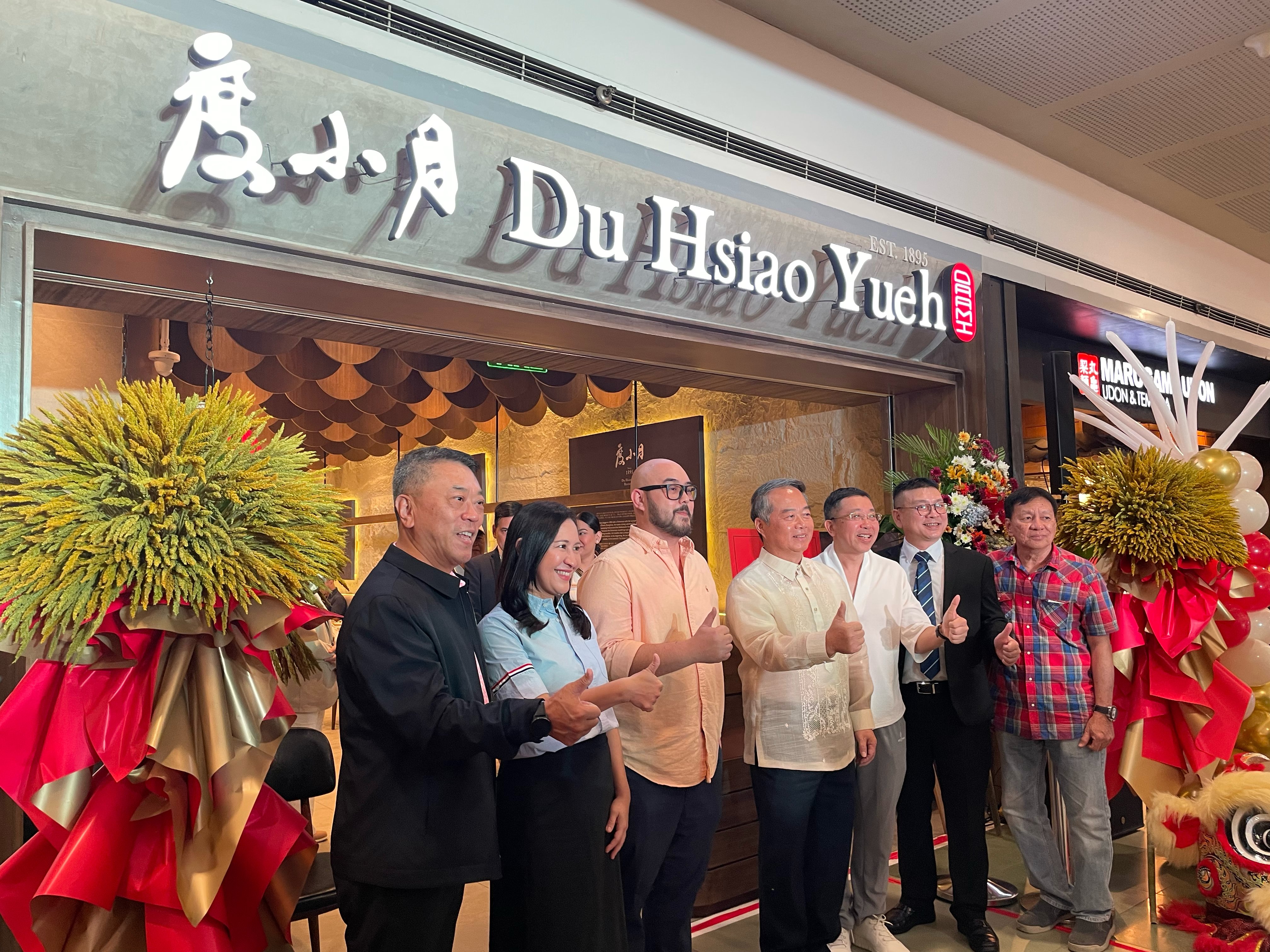Present at the opening of Du Hsiao Yueh is Quezon City Mayor Joy Belmonte (second from left), Ambassador of Taiwan to the Philippines Wallace Minn Gan Chow (fourth from left) and representatives from the Taiwan office of Du Hsiao Yueh.