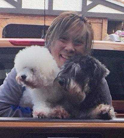 TRIBUNE Life Top Form editor and awardee Kathy Moran with Vodka and Boris.