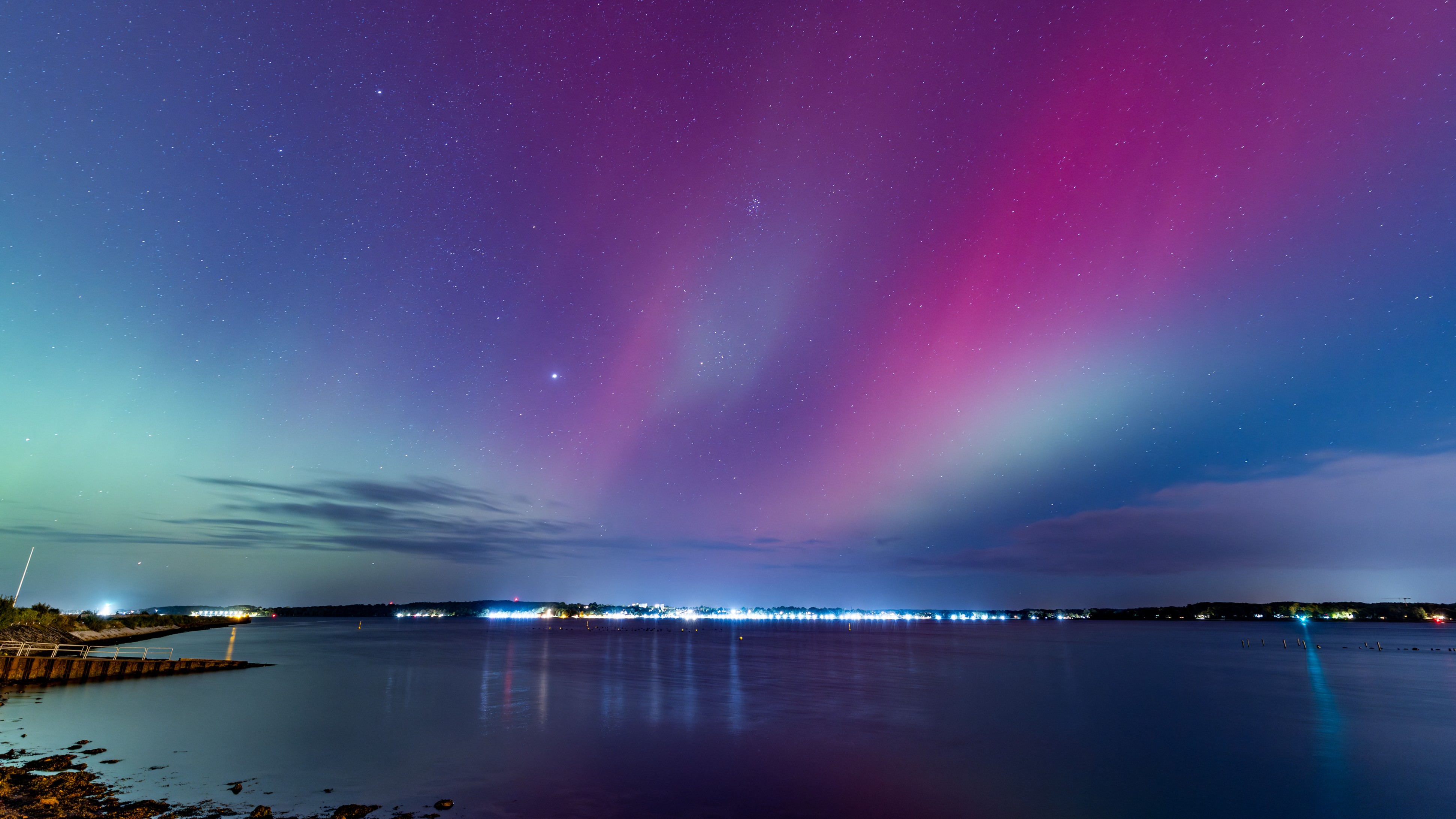 Northern lights (Aurora Borealis) are seen over the Baltic Sea close to Kiel, northern Germany, on 10 October 2024.