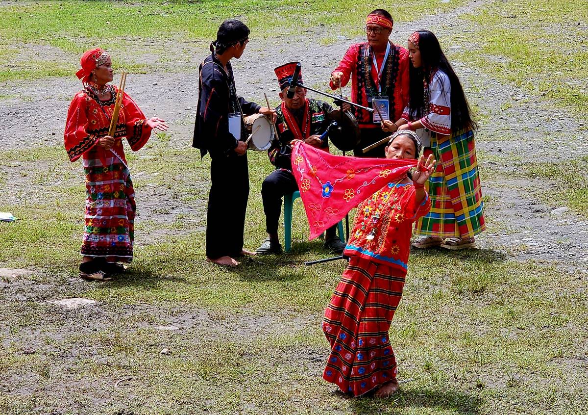 Panay Bukidnon delegate performing a traditional dance.