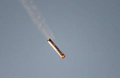 SpaceX 'catches' megarocket booster after test flight