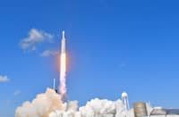 Lift-off A powerful SpaceX Falcon Heavy rocket carries the probe at the start of its five-year journey.