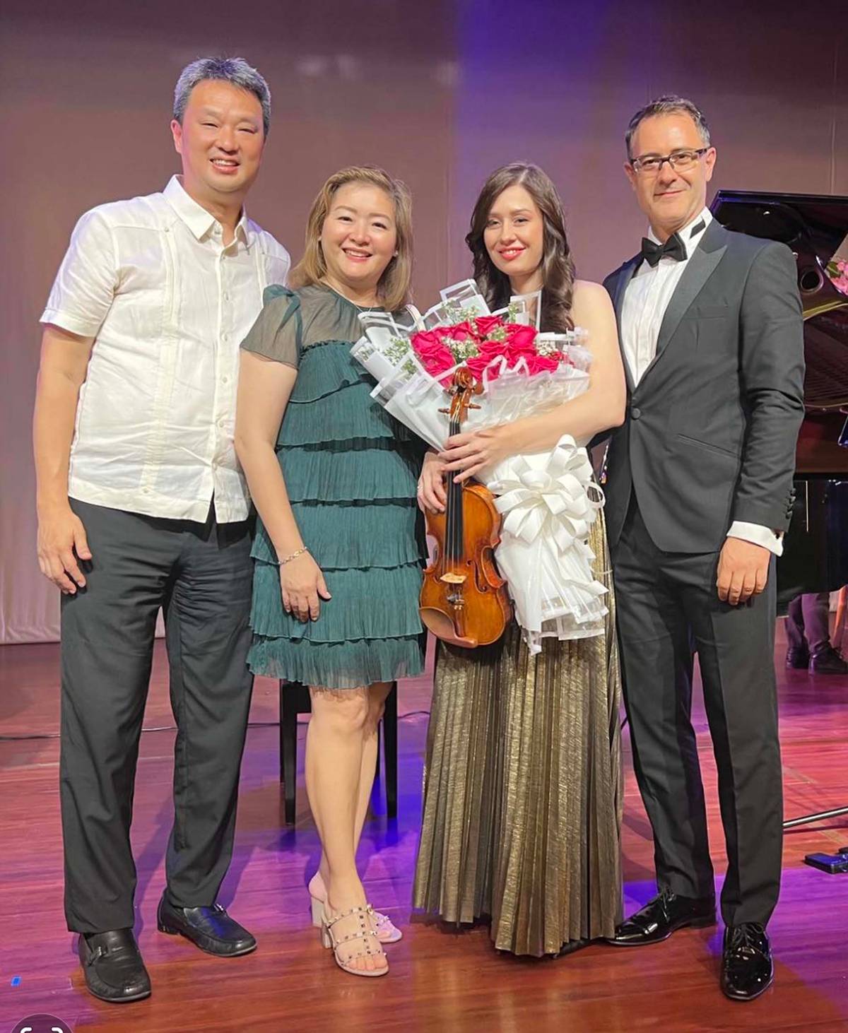 Honorary Consul of Romania in Cebu Grand Benedicto and his wife Genevieve with Romanian artists Diana Jipa (violinist) and Stefan Doniga (pianist).