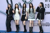 LOOK: K-pop girl group NewJeans members pose on the blue carpet at the 2025 Spring/Summer Seoul Fashion Week at Dongdaemun Design Plaza in Seoul on 3 September 2024. | Photo courtesy of AFP