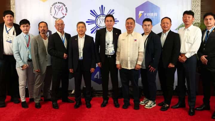 Philippine Olympic Committee President Abraham “Bambol” Tolentino (in Barong Tagalog) poses with Asian mixed martial arts executives, officials, and stakeholders, including VIP Director of 9 Dynasty Group Derries Wong, pro fighter Kazuhiro Sakamoto, Asian Mixed Martial Arts (AMMA) Sports Committee Chairman Wang Zuankan, Jiang Longyun, AMMA President Gordon Tang, Okada Shie, and Nasyonal Mixed Martial Arts Pederasyon ng Pilipinas Secretary-General Alvin Aguilar.