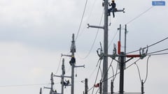 MIESCOR replaces electrical wire in Quezon City amid Meralco rate reduction