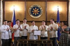 Marcos signs ARAL law to improve Phl education
