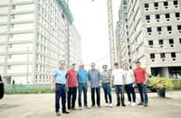 DHSUD Undersecretary Garry De Guzman (third from left), head of the Pambansang Pabahay para sa Pilipino Program Project Management Office, leads recent inspections of ongoing 4PH projects in San Fernado City, Pampanga. He notices the significant progress of the development and construction at the Crystal Peak Estates, being implemented by the Social Housing Finance Corporation.
