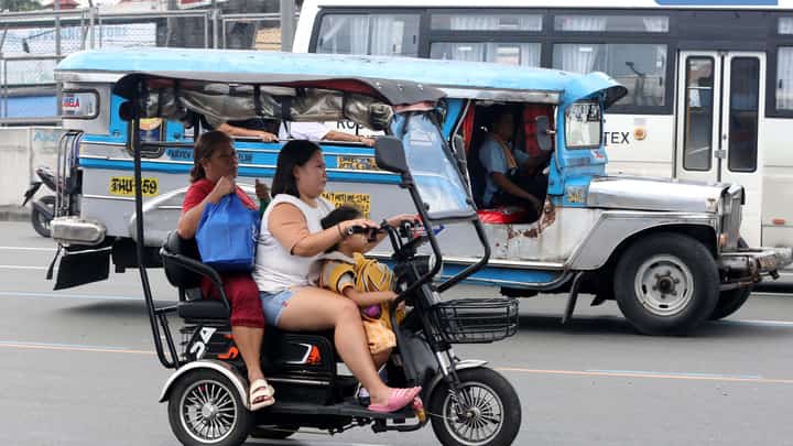 (October 19 2024)………..Private E-trike traveling along Commonwealth Avenue in Quezon City, the Land Transportation Office (LTO) is temporarily suspending the requirement to register e-trikes and e-bikes operated on public roads and highways, as well as the requirement for users to have a driver's license and wear helmets.……..Photo/Analy Labor