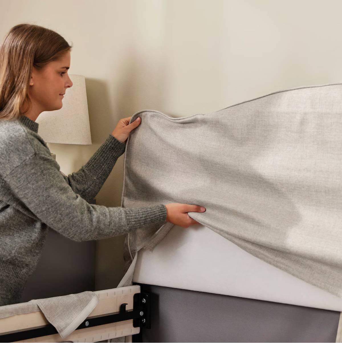 RAMNEFJALL upholstered bed frame.