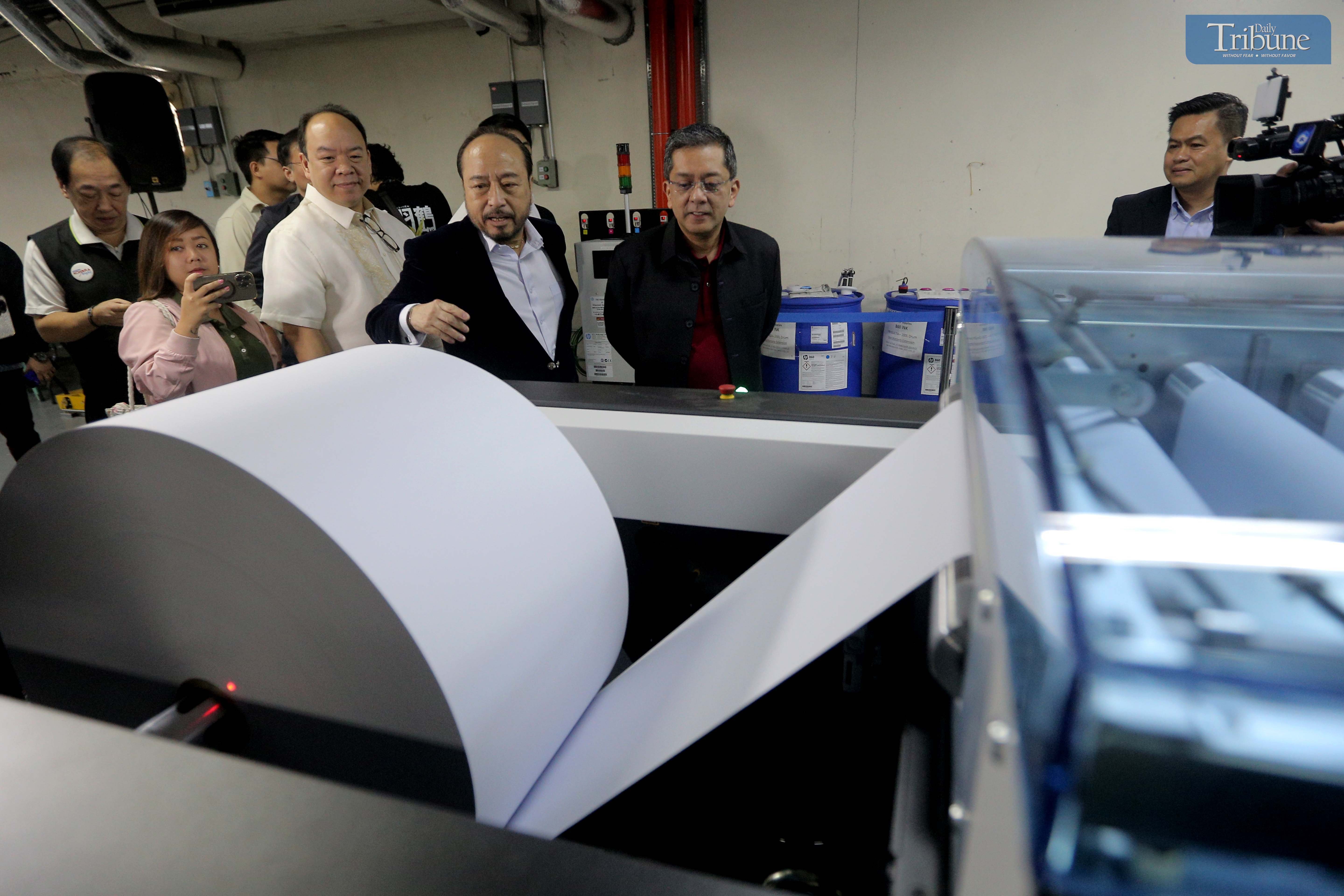 Ceremonial turnover of new ballot printing machines