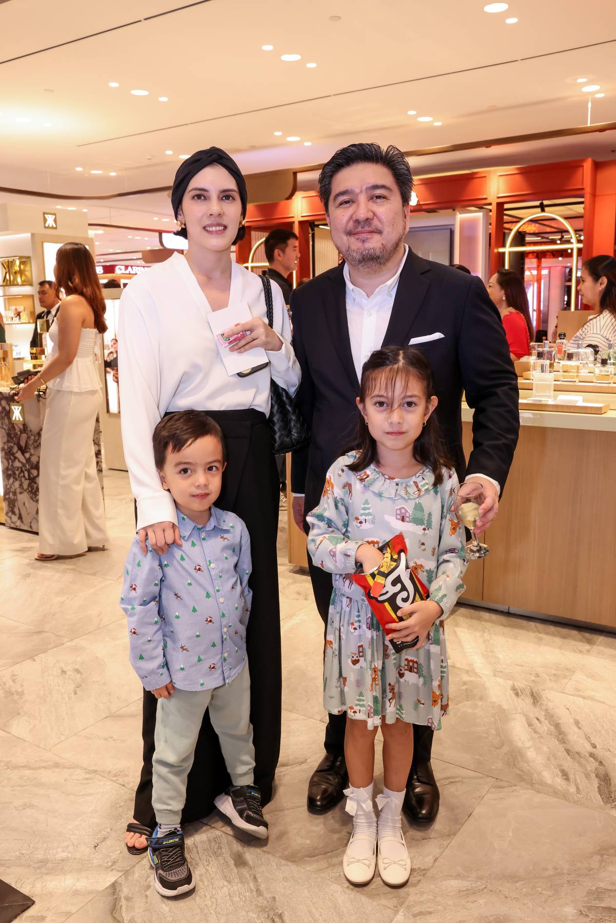 Isabella and MJ Tantoco with kids Isoletta and Jose Ennio.