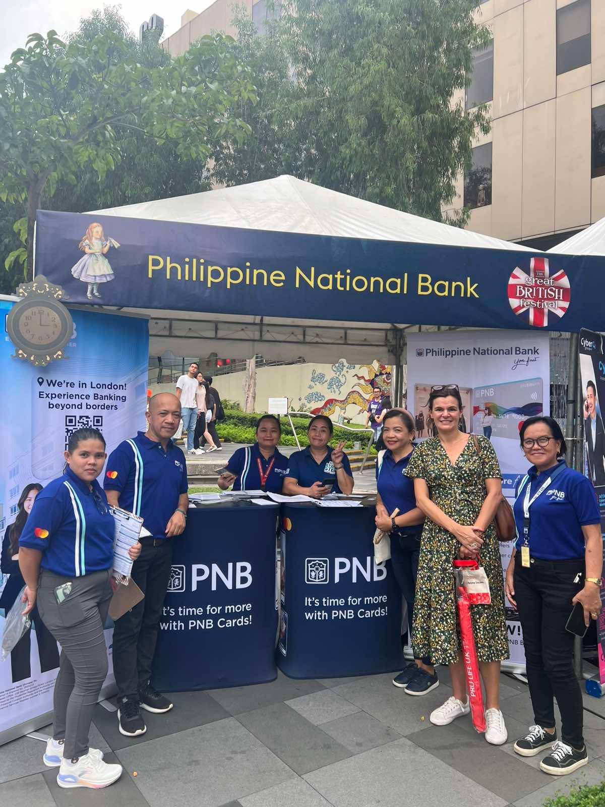 LOOK: British Ambassador to the Philippines Laure Beaufils (in green dress)visits stalls of Filipino and British businesses during the Great British Festival at  the Bonifacio High Street Amphitheatre in Bonifacio Global City, Taguig City.