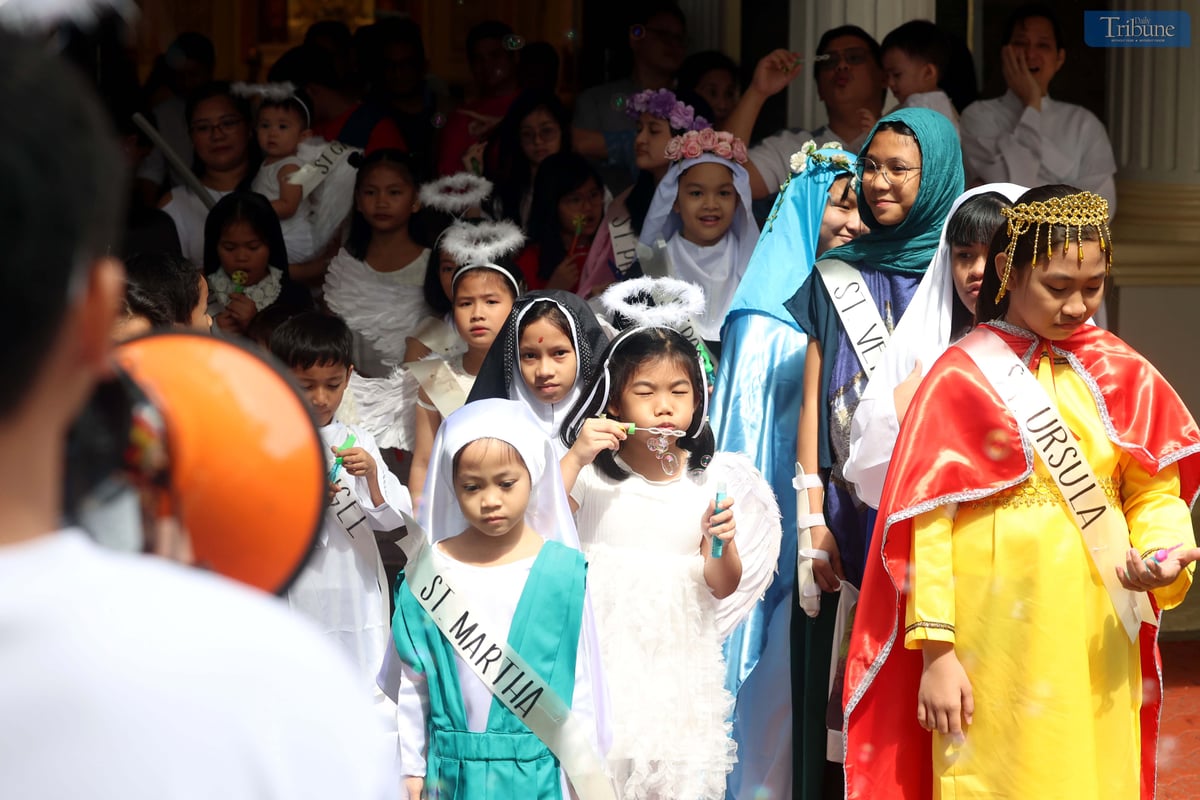 Children dressed as various Catholic saints.