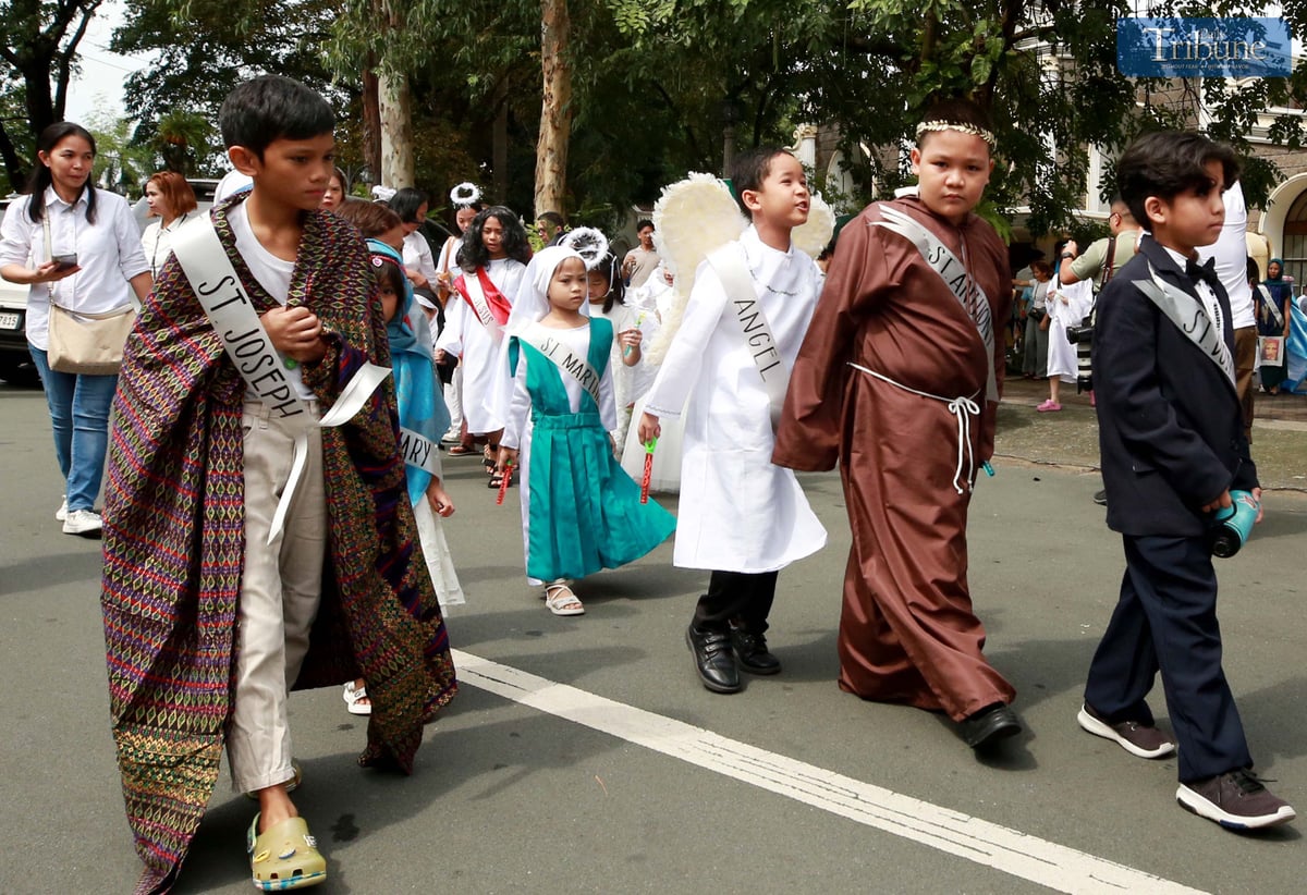 Children dressed as various Catholic saints.