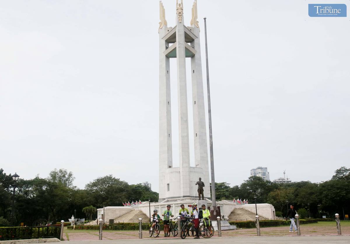 Sunday cyclists snap a selfie in Quezon City Memorial Circle.