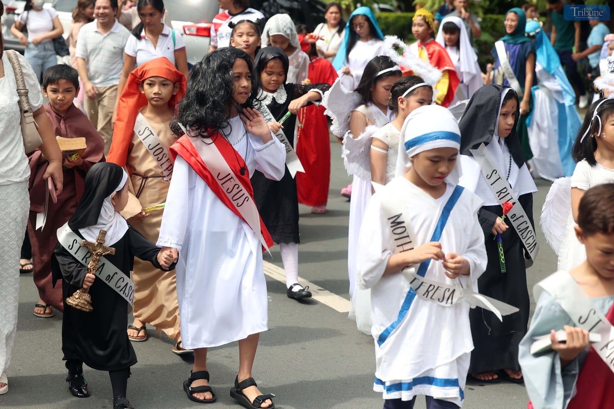 Children dressed as various Catholic saints.