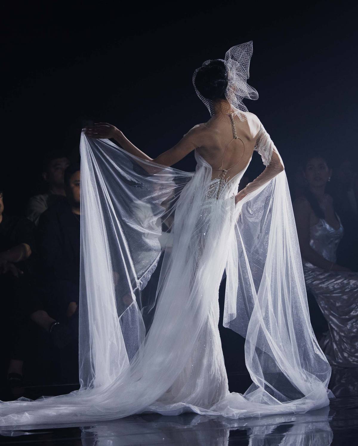 Backless gown combines elegance with a touch of allure by Francis Libiran.