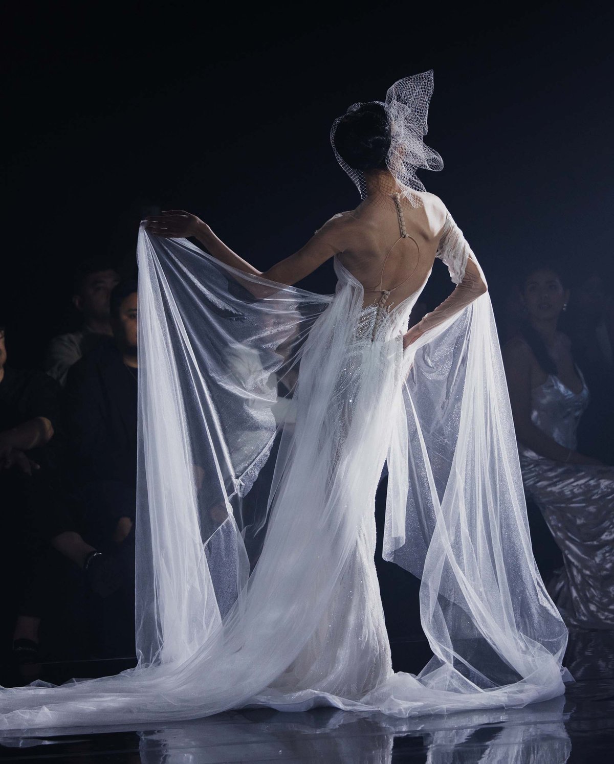 Backless gown combines elegance with a touch of allure by Francis Libiran.