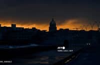 LOOK: View of the city at dawn during the fourth day of a massive power outage in Havana on 21 October 2024. Electricity has been restored to half of Havana, the Cuban capital's power company reported Monday, four days after the start of a nationwide power blackout that the authorities have struggled to fix. | Photo courtesy of YAMIL LAGE / AFP