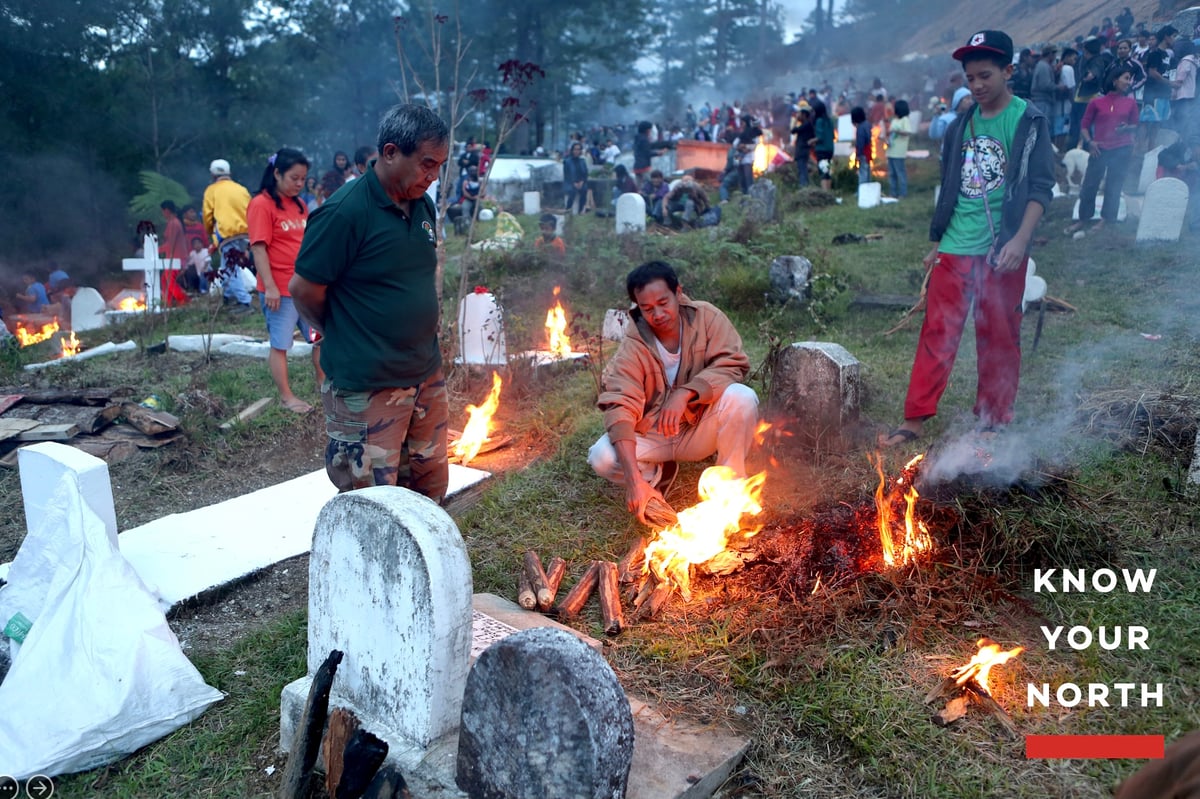 Locals had gathered to light fires around the graves of loved ones in observance of Panag-apoy, Sagada’s All Saints Day commemoration.