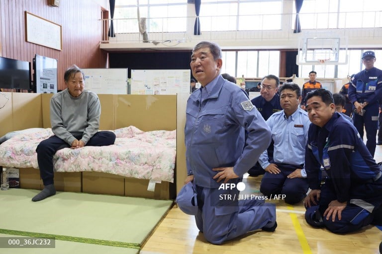 Japan urges evacuation amid heavy rain