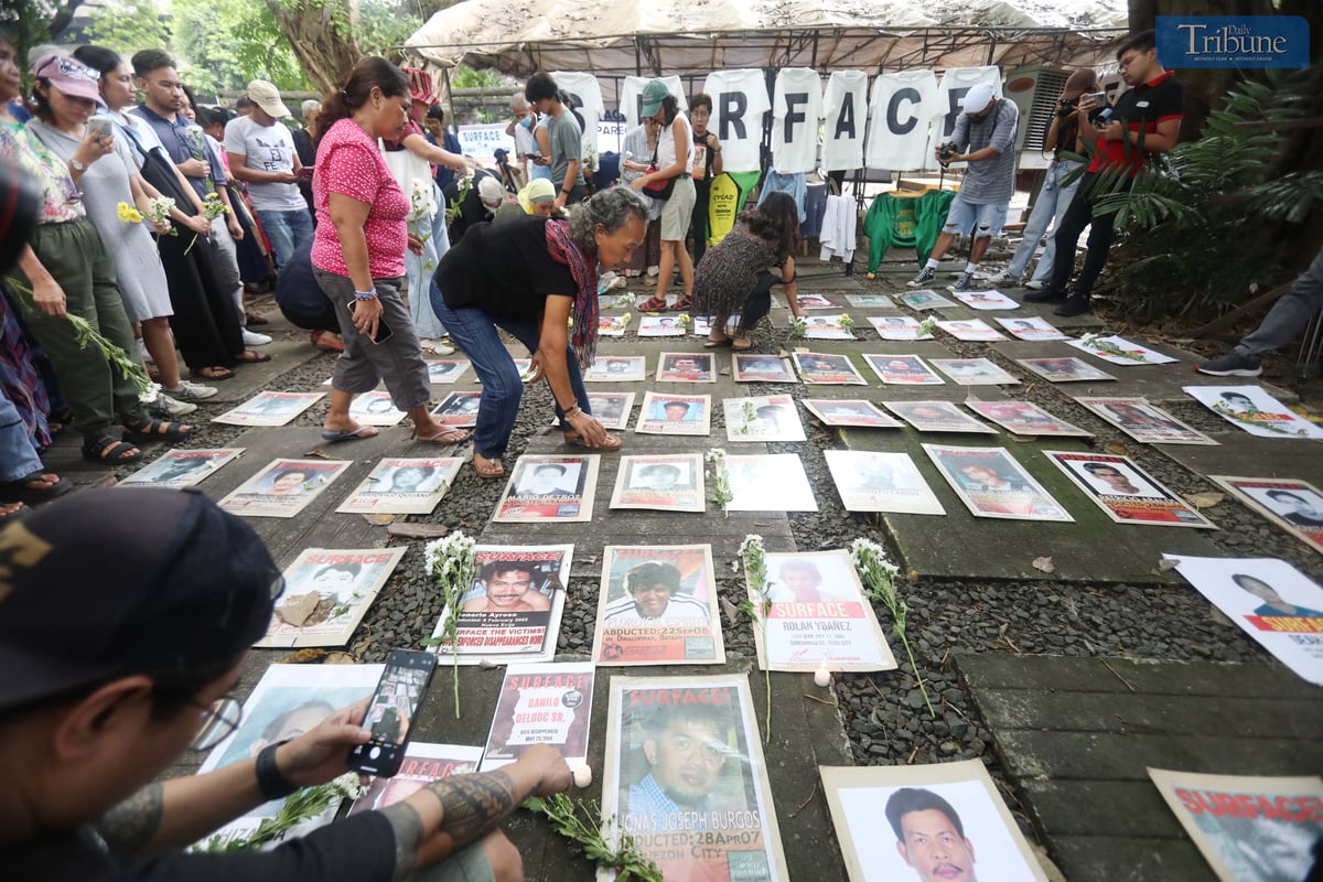 Families of Desaparecidos commemorate the victims of enforced disappearances with flowers and candles on All Souls Day.