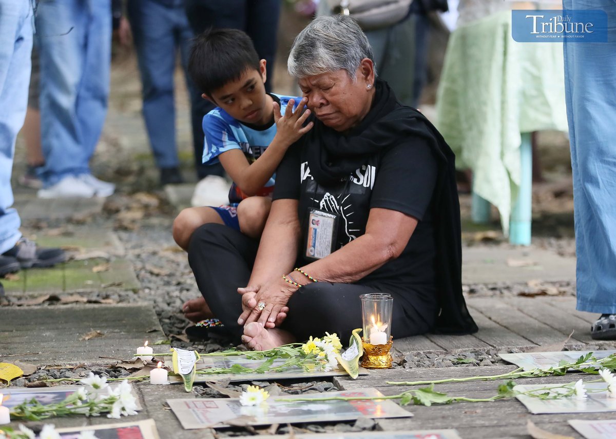Families of Desaparecidos commemorate the victims of enforced disappearances with flowers and candles on All Souls Day.