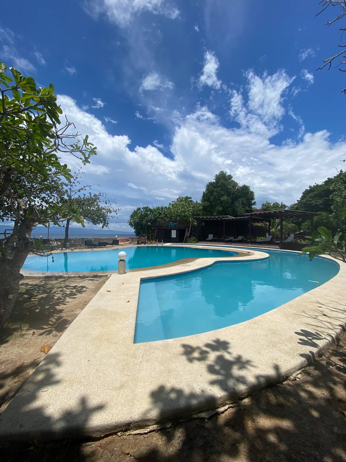 Inviting pool by the sea.