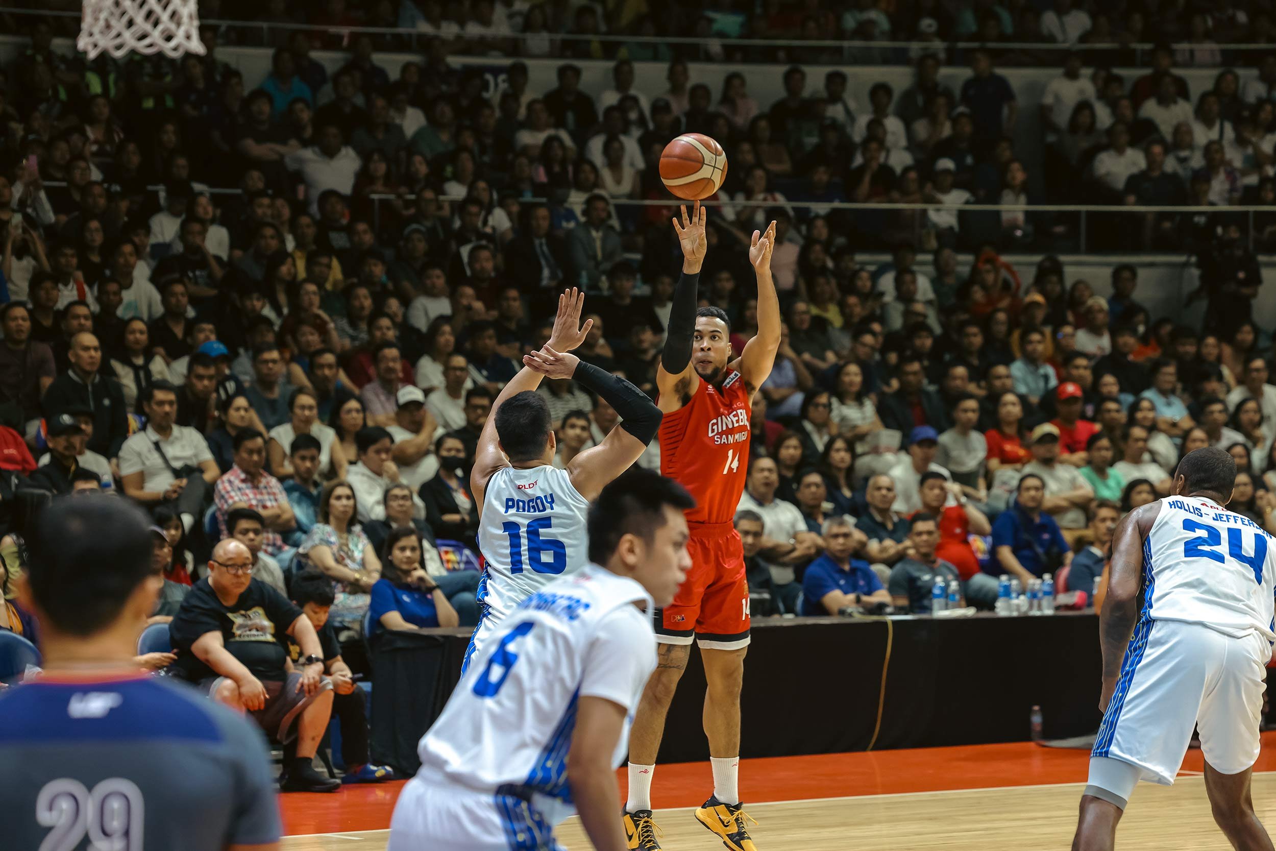 Stephen Holt connects a crucial trey as Ginebra beats TNT, 106-92, to tie the PBA Governors' Cup finals series to two games apiece Sunday at the Smart Araneta Coliseum.
