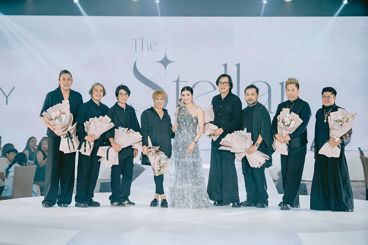 DFDC designers join Discovery Samal president Beatrice Gonzalez-Magallanes (center) after the fashion show. From left: Aztec Barba, Emi Alexander Englis, Windel Mira, Benjie Panizales, Popoy Barba, Egay Ayag, Edgar Buyan and Dodjie Batu.