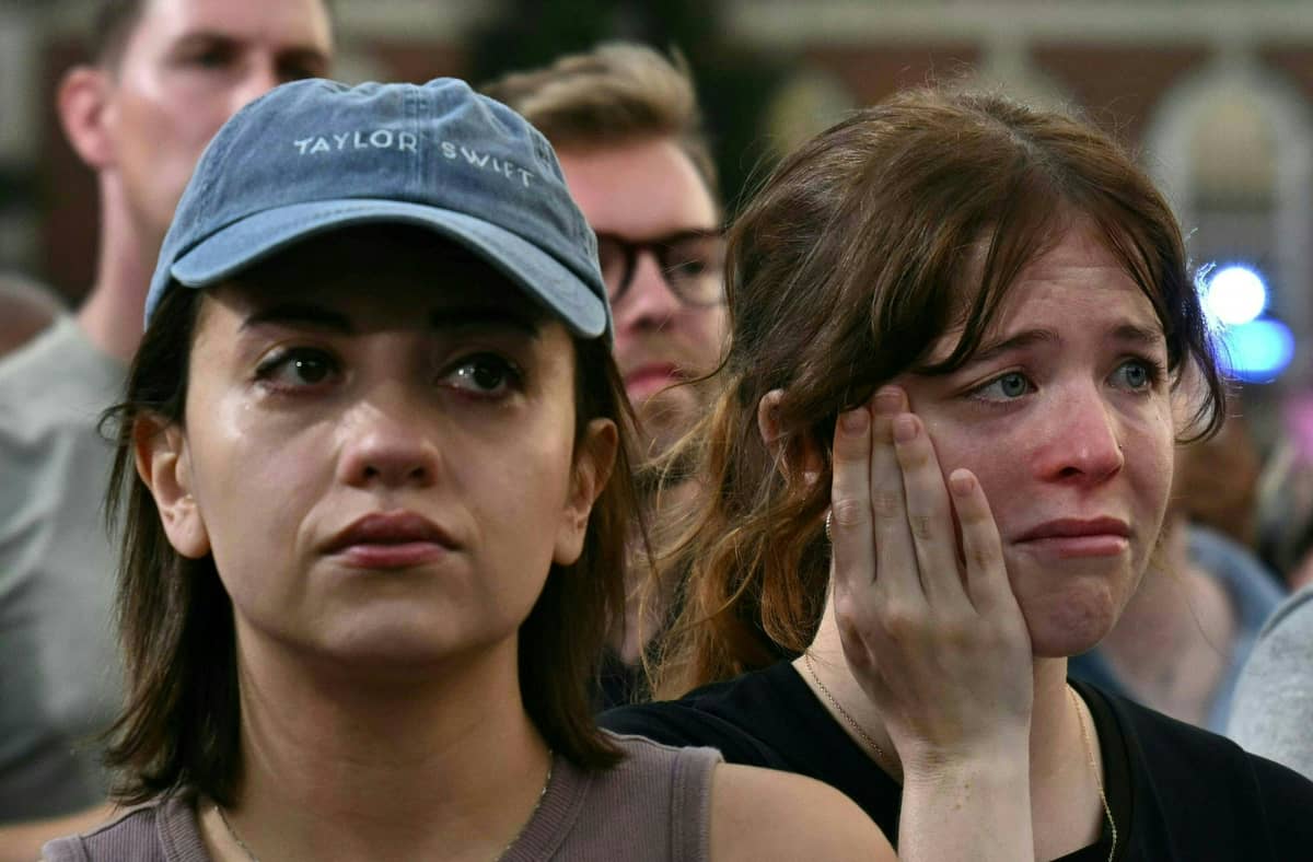 People react as US Vice President Kamala Harris speaks at Howard University in Washington, DC, on 6 November 2024. Donald Trump won a sweeping victory Wednesday in the US presidential election, defeating Kamala Harris to complete an astonishing political comeback that sent shock waves around the world.