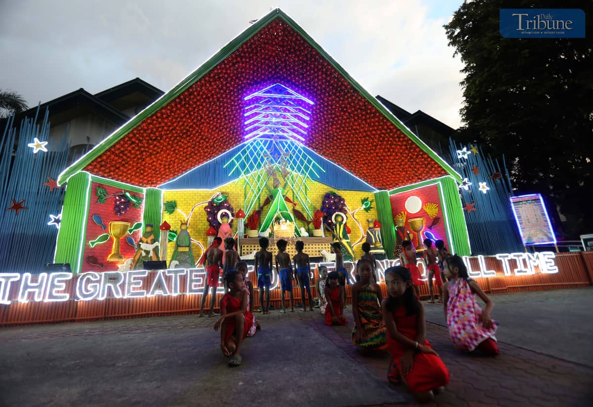 Pupils from Maasin Community Elementary School in San Clemente, Tarlac, perform the Talipe dance during the opening of the 17th Belenismo sa Tarlac on Tuesday night, 5 November 2024.