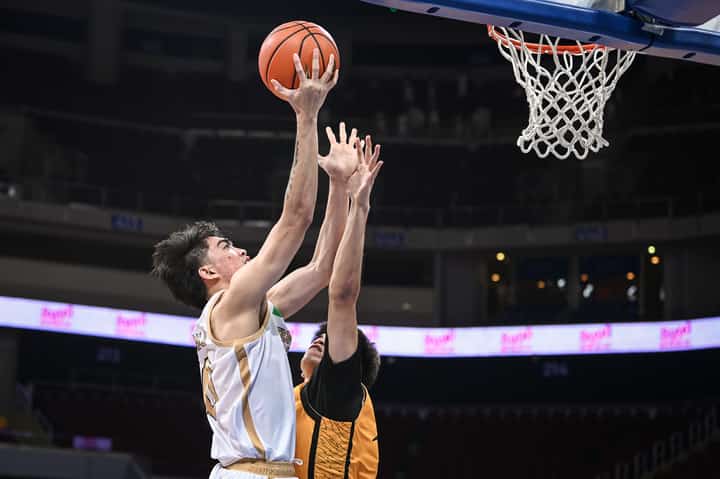 Jolo Manansala stars in NU's 67-62 comeback win over UST in the UAAP Season 87 men's basketball tournament.
