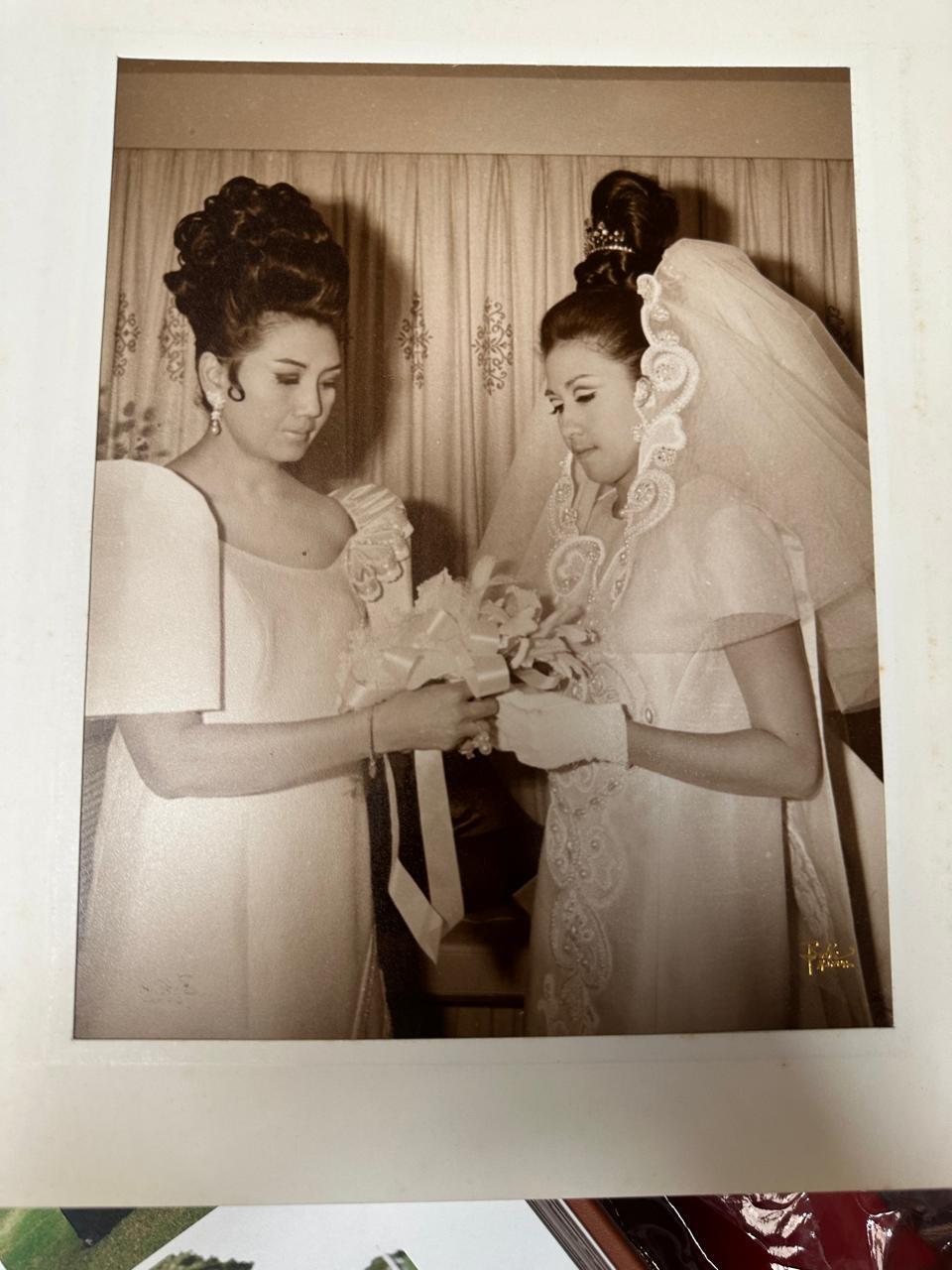 Mother and daughter dressed in bridal couture by Ramon Valera.