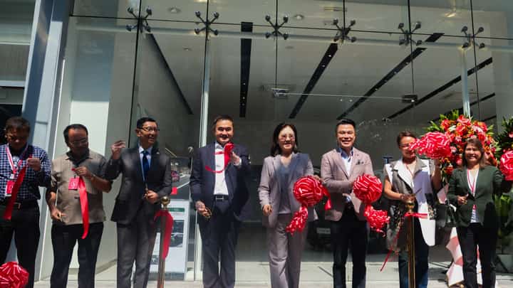 Going electric Tesla Philippines store manager Ian Rojas; Special Assistant to the President for Investment and Economic Affairs Secretary Frederick Go, Tesla regional director Isabel Fan and chief strategy officer of Megaworld Corporation Kevin Tan.